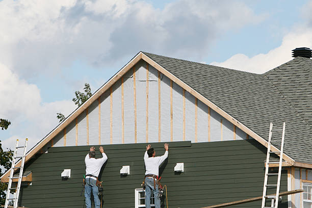 Professional Emergency Siding Repair technician working in Madisonburg, PA